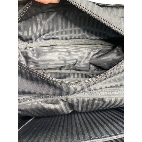 Tumi Black leather Backpack with Adjustable Straps and Durable Design - Picture 10 of 13